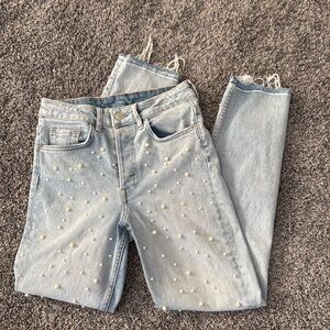 Light wash pearl embellished jeans